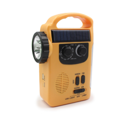 Manual-powered emergency radio lamp
